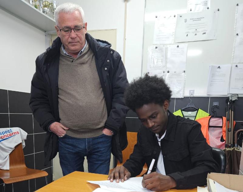 L-R: President, Brito Sport Club, Jose de Castro Dias and Nigerian-born young footballer, Yaqub Usman-Malah during the official contact signing in Portugal recently