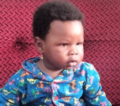 *  Baby Chinedu Sampson, the found missing child.
