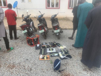 *  The alleged fraudsters and the items recovered from them.