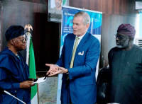  *  L-R: Chief Adegboyega Oyetola, Nigeria's Minister of Marine and Blue Economy exchanging pleasantries with Prof Gunter Pauli, creator of Blue Economy (middle) and an official of the ministry.
