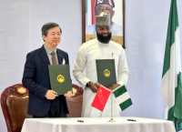 Mr. Khalil Halilu, the Executive Vice Chairman and Chief Executive Officer (EVC/CEO) of NASENI (right) and a representative of the Chinese partners.