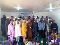*  One of the groups in a group photograph after their inauguration.