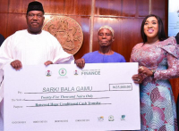 L-R:  Senator George Akume, Secretary to the Government of the Federation (SGF), a beneficiary and Dr Beta Edu, Honourable Minister for Humanitarian Affairs and Poverty Alleviation.